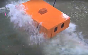 Orange submersible in the water